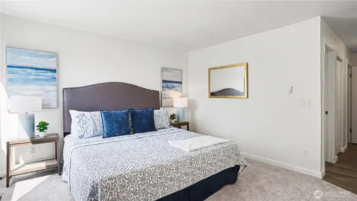 The spacious primary bedroom.