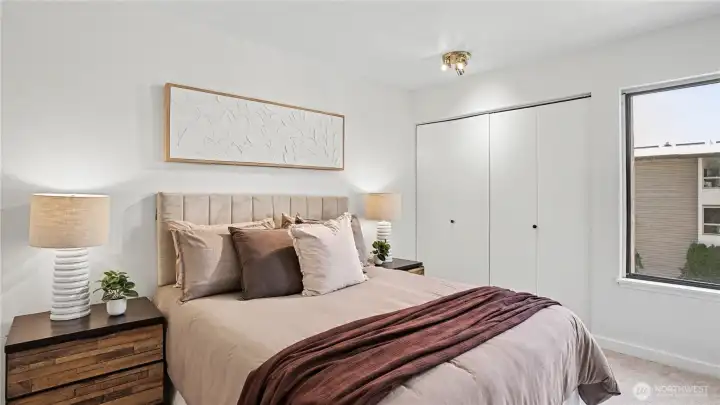 The second bedroom and full bath offer comfort for guests or a home office.