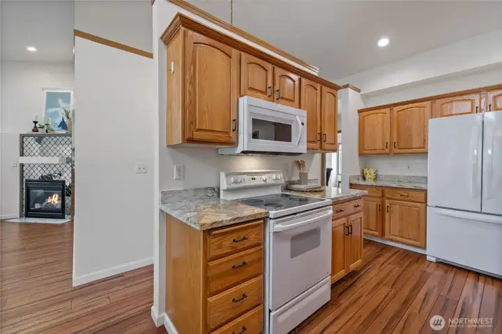White appliances compliment the beautiful marble countertops, must see! White appliances compliment the beautiful marble countertops, must see!
