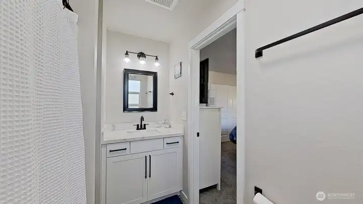 Primary three-quarter bathroom