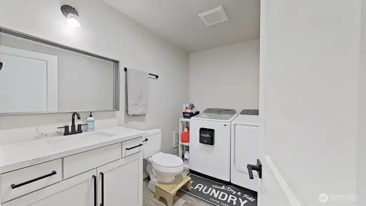 Lower level half bath & laundry