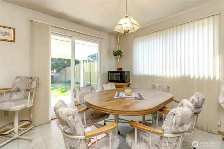 Kitchen eating area with patio access