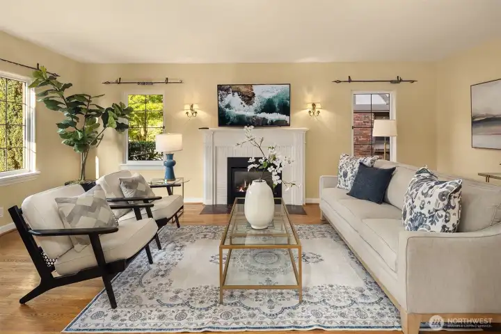 Formal living room with gas fireplace and leaded windows. Formal living room with gas fireplace and leaded windows.