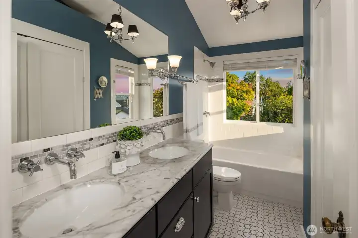 Double vanity and extra storage in this full bathroom primary suite. Double vanity and extra storage in this full bathroom primary suite.