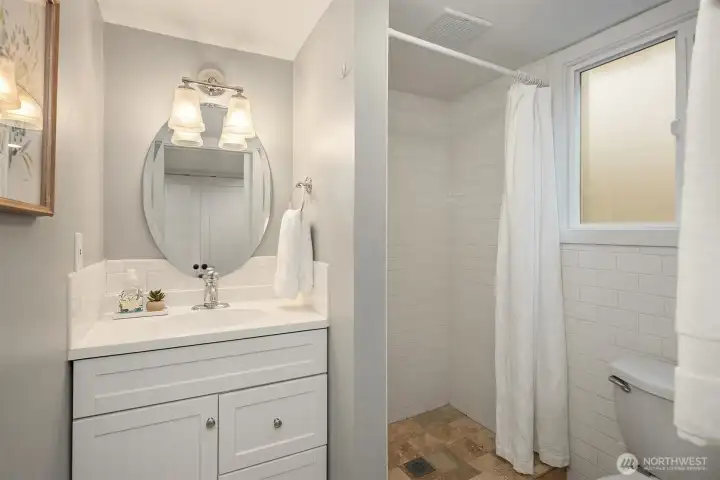 Basement level bathroom. This is a 3/4 bath. Basement level bathroom. This is a 3/4 bath.