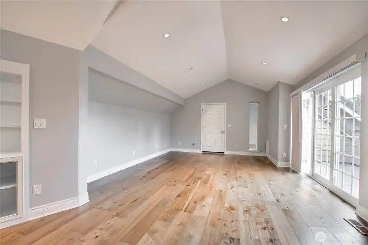 Primary bedroom with vaulted ceiling Primary bedroom with vaulted ceiling