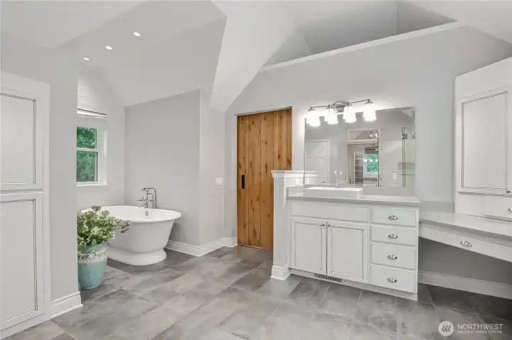 Updated Primary bathroom has free standing tub and 2 separate sink/cabinet Updated Primary bathroom has free standing tub and 2 separate sink/cabinet