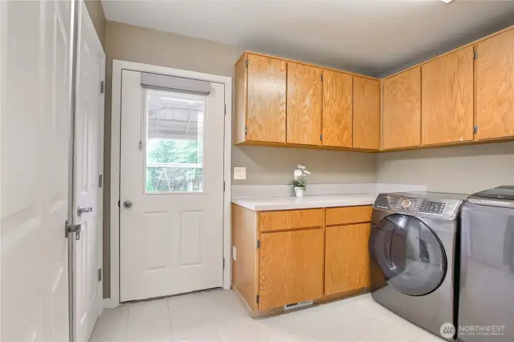 The laundry room has excess door to the backyard The laundry room has excess door to the backyard