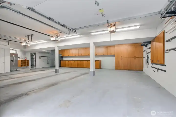 Oversized 3 car garage have wall of built-in cabinets Oversized 3 car garage have wall of built-in cabinets