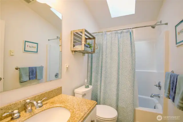 Main floor full bath with skylight