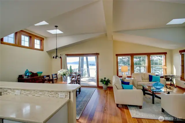 Open concept living. View from kitchen looking into Dining room and Living room. The view will leave you awe struck, when seen in person.