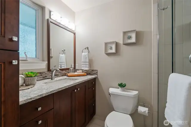 Primary bath with a large walk-in shower.