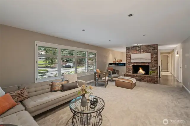 Cozy living room with a wood-burning fireplace view.