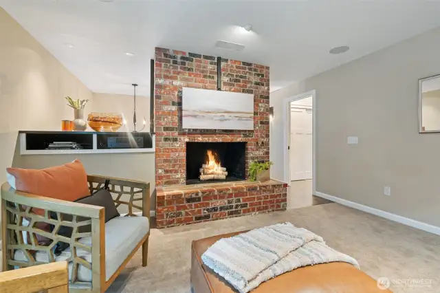 Living Room- Cozy wood-burning fireplace.