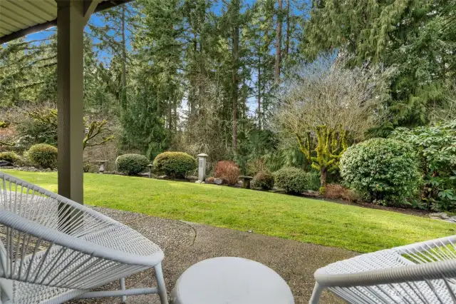 Lower patio with a relaxing view of the yard.