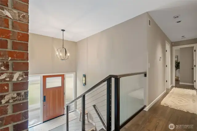 Hallway leading to bedrooms and bathrooms.