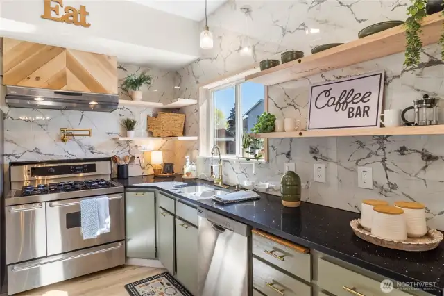 Custom wood working on range hood and ends of island bring character and tasteful elegance!