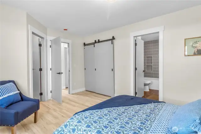 You will find both a walk in closet and a second closet with barn rolling doors.