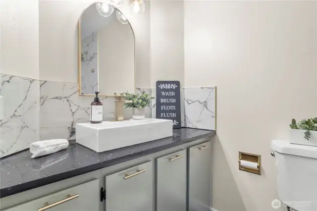 Hallway bathroom with quartz counter also features updated fully tiled shower and fixtures!