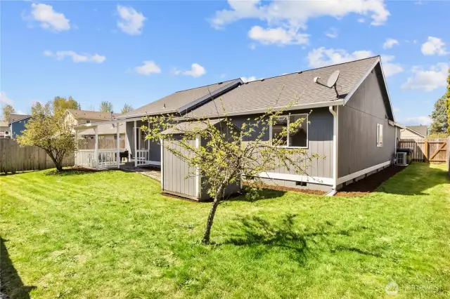Large back yard space to entertain this summer is fully fenced! Offers bright sunny area to garden and a separate garden shed for more storage!