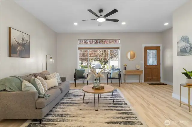 Large front picture window lets ample light in making this room light and bright!