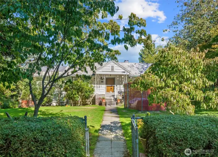 Home sits on an expansive 10,604sqft corner lot.