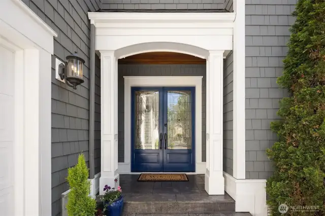 Double door entry to formal and informal spaces