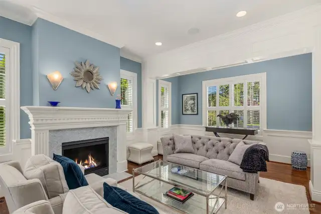 Formal living room with Carrara marble fireplace