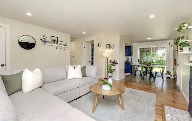Opens up into dining and kitchen area.