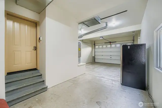 Two car garage with third bay in tandem