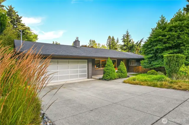 Beautifully updated one-level luxury home on a privately situated corner lot.