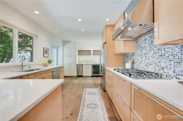 A closer look at the stunning kitchen with plenty of counterspace for the love of cooking!