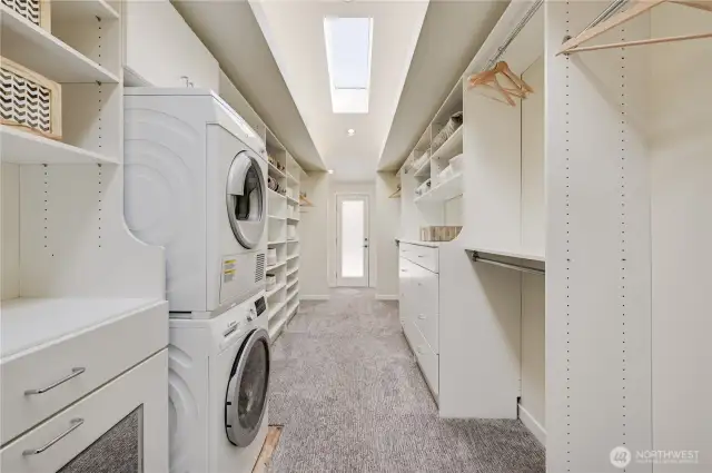 Fabulous walk-in closet, so much storage space.
