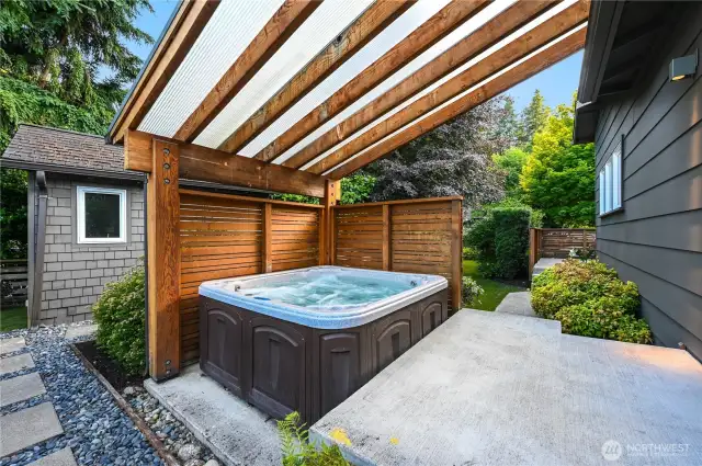 A covered patio for late night or year-round soak in the hot tub just steps from your primary suite!