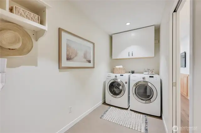 Spacious laundry room plus perfect mud room and additional storage off the garage.