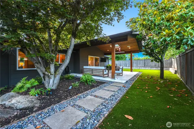 Walk-way from the rear of the home to the outdoor heated patio and the hot tub and storage shed in the opposite direction.