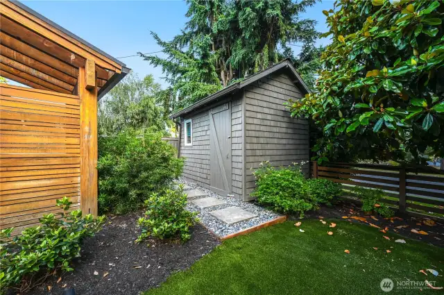 Darling shed for the gardener's tools or anything that needs storing.