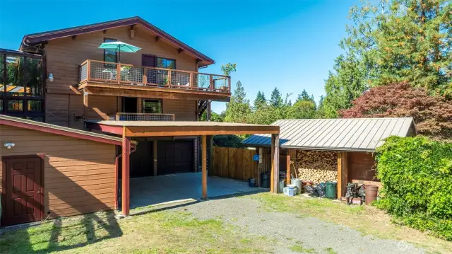 Rear Carport in front of Garage/Shop, plus covered wood storage