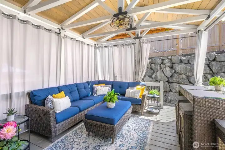 Outside covered gazebo allows for entertaining in all weather!