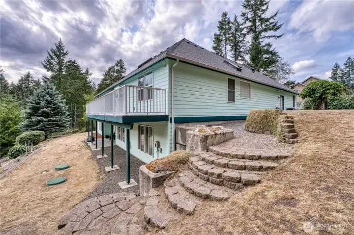 View of the large side Trex Deck and Lower Level Covered Patio....