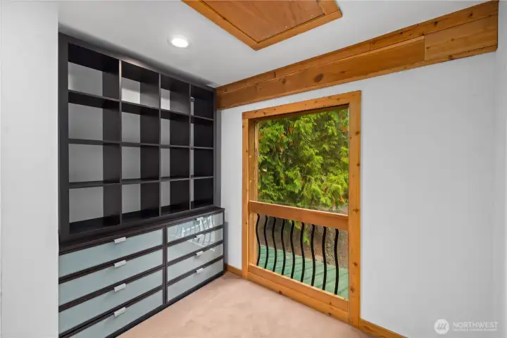 The entire second level serves as the primary suite with the area just off the primary bath used as closet space.
