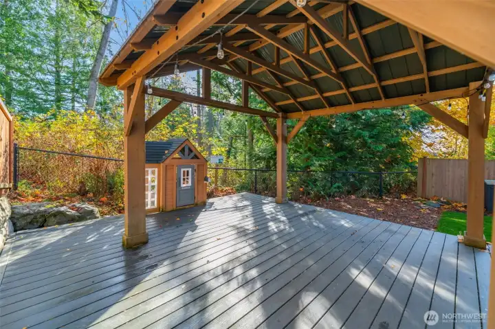 Rear patio with covered pergola. backing up to NGPA land.