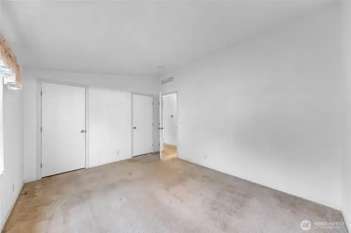 Primary Bedroom view from the Bathroom to the Hallway.