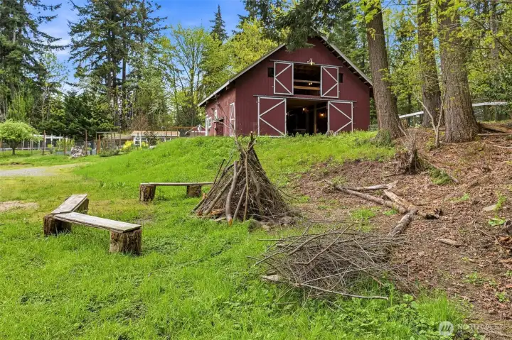 View of fire pit and barn from property trailhead