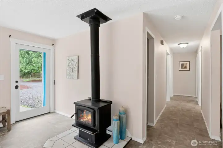 Wood burning stove for efficient heat