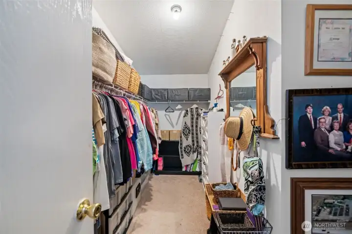 Huge primary bedroom walk in closet.