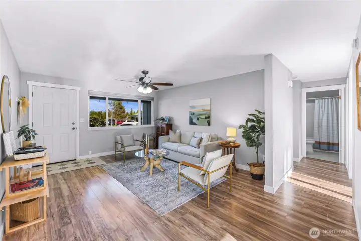 The bedrooms and bathrooms are down the hall to the right.