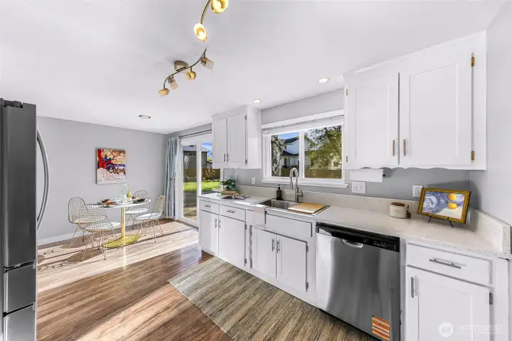 New kitchen sink and faucet were installed with the new countertops