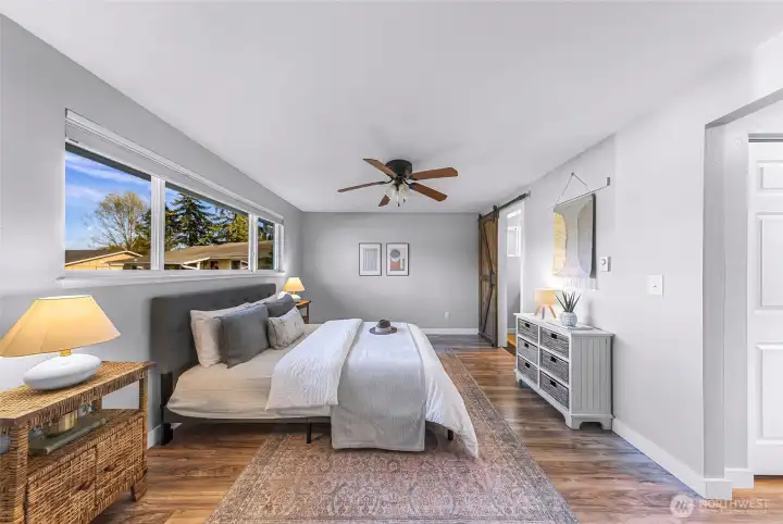 The primary bedroom also has top down bottom up blinds for privacy and light, and a ceiling fan for comfort
