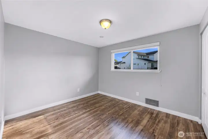 Bedroom 3 also faces the back yard.